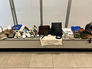 aeroporto-falcone-borsellino-sequestrati-capi-di-abbigliamento-e-accessori-contraffatti